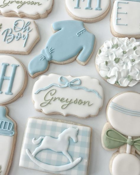 Everything about this checks my favorites list 🤩 the shade of blue, the monogram, the gingham, the ribbon, the hydrangea just yessss!! 🤍 #babyshowercookies #babycookies #babyboycookies #boybabyshowercookie #babyboycookies #babyboy #babyshower #customcookies #cookiesofinstagram #cookies #royalicing #royalicingcookies #dfwcookies #dfwcustomcookies #dfwparties #argyletx #colleyvilletx #southlaketx #flowermoundtx Boy Baby Shower Cookies Decorated, Locally Grown Baby Shower Cookies, Vintage Blue Baby Shower Ideas, Blue Bow Baby Shower Theme, Green And Blue Baby Shower Ideas, Blue And Green Baby Shower Ideas, Blue Gingham Baby Shower Ideas, Gingham Baby Shower Ideas, Light Blue Baby Shower Ideas