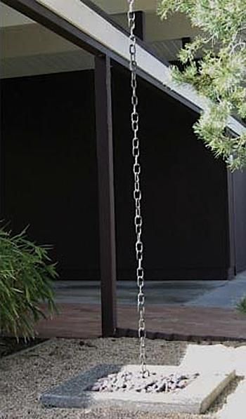 Rain chain. This is much prettier than the traditional gutter! In the summer when the water runs down the chain, it makes a babbling noise as the water hits and echos off of the whiskey barrel.....and a great way to save rain water for your garden! Japanese Rain Chain, Pergola Design, Rain Chain, Rain Barrel, The Chain, Delphinium, Design Software, Outdoor Projects, Japanese Garden