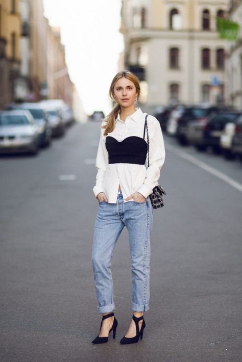 This season, corsets are taken to the next level The post How To Wear Corset Trend appeared first on Career Girl Daily. Bustier Over Shirt, Top Over Shirt, Look Jean, Black Bustier, Outfit Chic, Crop Top Dress, Wear Crop Top, Boyfriend Jean, Outfit Jeans