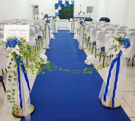 Royal blue and white for royal blue wedding colors 2025, royal blue bridesmaid dresses, white bridal gown, royal blue groomsmen suits, white wedding tablecloth, royal blue vases décor and white flowers centerpieces, white wedding cake with royal blue flowers, white wedding aisle chairs with royal blue ribbons, white and royal blue wedding table number card. Royal Blue Groomsmen Suits, Royal Blue Wedding Colors, Royal Blue Groomsmen, White Wedding Aisle, Wedding Colors 2025, Royal Blue Centerpieces, Bridesmaid Dresses White, Blue Wedding Colors, Quince Planning