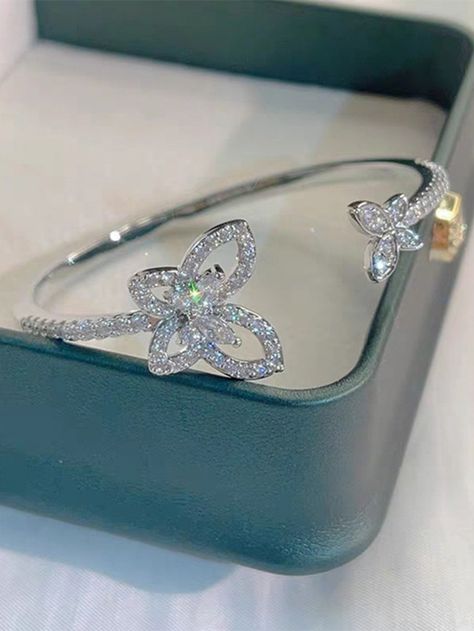 1pc Cubic Zirconia Butterfly Open BangleI discovered amazing products on SHEIN.com, come check them out! Silver Bracelet Designs, Fancy Jewellery Designs, Open Bangle, Fancy Jewellery, Jewelry Lookbook, Watches Women Fashion, Fancy Jewelry, Dream Clothes, Bracelet Designs