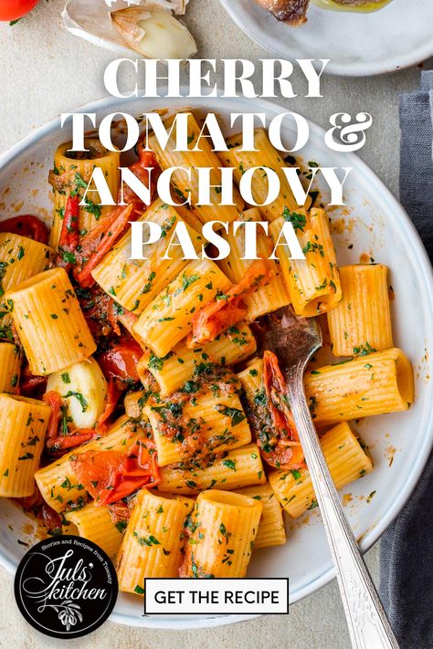 A bowl filled with pasta dressed with cherry tomatoes and anchovies with text "cherry tomato and anchovy pasta, get the recipe." Anchovies Recipes, Tomato Anchovy Pasta, Recipes With Anchovies, Spaghetti Sauce With Anchovies, Pasta With Anchovies And Tomatoes, Pasta With Anchovies And Capers, Italian Cherries, Anchovy Pasta, Anchovy Recipes