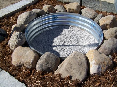 Fire Pit Idea... would replace the mulch with river rock... LIKE IT! Diy River Rock, Cheap Fire Pit, Fire Pit Plans, How To Build A Fire Pit, Backyard Fire Pit, Fire Pit Materials, Fire Pit Ideas, Fire Pit Chairs, Fire Pit Ring