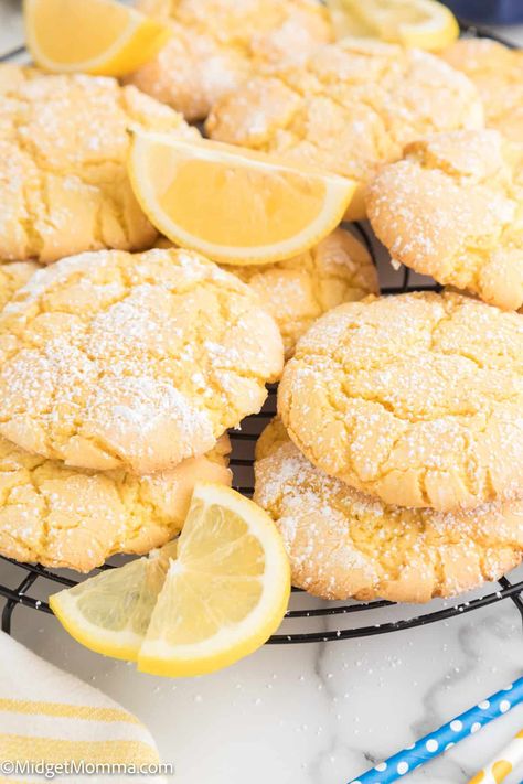 Love Lemons? Then you are going to be a big fan of this easy cake mix cookie recipe. Lemon Cake Mix Cookies are the perfect way to get your lemon fix! These cookies are light, fluffy, and full of lemon flavor. They're perfect for a quick and easy dessert. Also known as Lemon Crinkle Cookies, these cookies are sure to be a hit with anyone who takes a bite! Lemon Yogurt Bread, Funfetti Cake Mix Recipes, Lemon Baking, Lemon Sweets, Nora Cooks, Lemon Cake Mix Cookies, Lemon Crinkle Cookies, Cake Mix Cookie Recipes, Lemon Cake Mixes