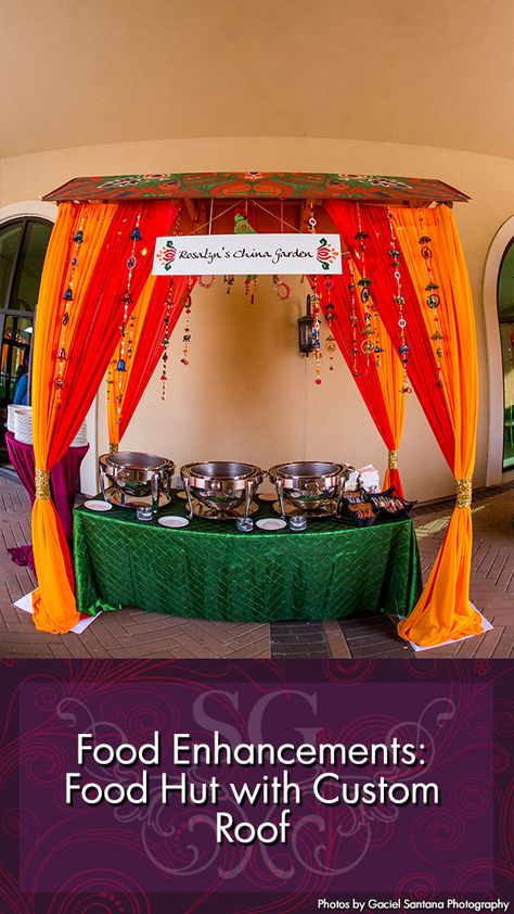 Food Enhancements. Food Hut with Custom Roof. -------- #decorbysuhaaggarden #suhaaggarden#stylingwithjilna #ceremony #accessories #photobooth #southasianwedding #indianwedding #garbadecor #garba #garbanight #sangeetdecor #mehndidecor #preweddingdecor #weddingdesigner #luxurywedding #elegantwedding #customroof #acryliccubes #favorcart #decorativecubes #floralpeacock #foodhut #floridaweddings #tampaweddings #orlandoweddings #colorfuldrapes #foodcart Food Stall Ideas For College Fest, Stall Decoration Ideas, Stall Decorations, Food Fest, China Food, Wooden Food, Mehndi Decor, Wedding Backdrop Decorations, Food Stall