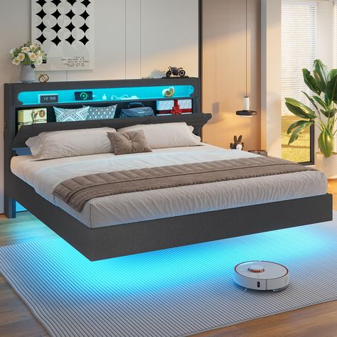 PRICES MAY VARY. 【Unique Floating Bed Frame】-The unique hidden bed foot design is different from the traditional bed frame, giving people a dreamy and light feeling that the bed is floating above the ground. The floating design and LED lights complement each other, creating a sense of modern technology and bringing a unique and novel visual experience. 【Multi-Function RGB LED Light】- Elevate your home life with the bed frame's RGB LED light belt. Effortlessly customize LED color, brightness, mod Teen Boy Bed, King Size Bed Designs, Contemporary Beds, Floating Platform Bed, Led Bed, Wall Panels Bedroom, Floating Bed Frame, Led Beds, Floating Platform