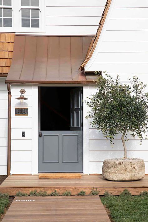 This dutch farmhouse on Coronado Island has the most fabulous details European Farmhouse Exterior, Raili Clasen, Farmhouse Exteriors, Outdoor Architecture, Orange Front Doors, Mill Work, House Beautiful Magazine, Colonial Farmhouse, Exterior Inspiration