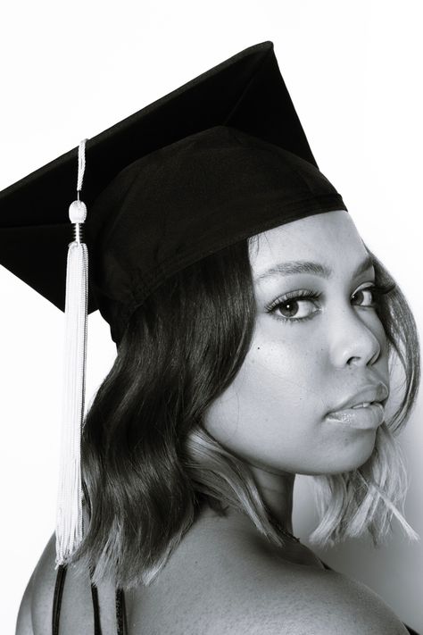 black and white editorial graduation shoot of black woman Graduation Pictorial Studio Pose, At Home Graduation Pictures, Graduation Photos Studio, Editorial Graduation Photoshoot, Black And White Graduation Pictures, Graduation Pictures Props, Graduation Pictorial Studio, Graduation Portraits Studio, Graduation Studio Photoshoot