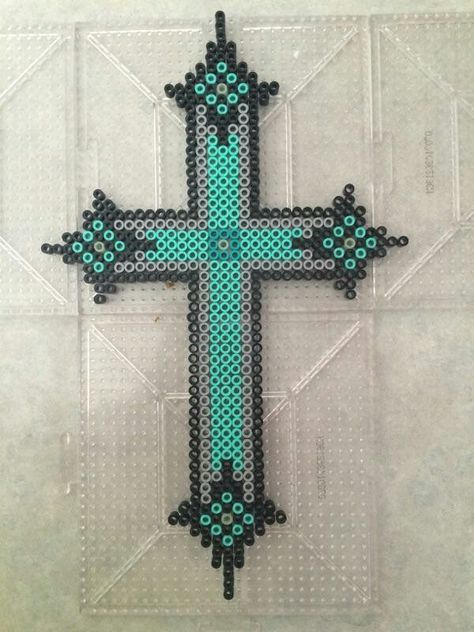 Self designed perler beads cross Perler Beads Cross, Cross Perler Beads, Perler Bead Ornaments Pattern, Perler Templates, Frame Ornaments, Perler Projects, Easy Perler Bead Patterns, Picture Frame Ornaments, Purple Cross