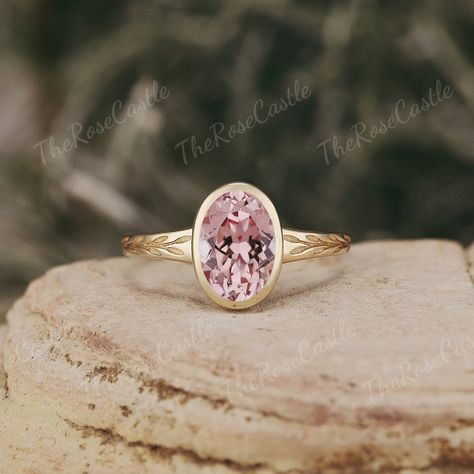 Pink sapphire engagement ring