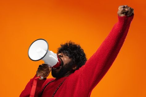 Young african american man in red hoodie... | Premium Photo #Freepik #photo #man-with-megaphone #african-man #black-person #black-man African American Man, Black Person, Black Man, Red Hoodie, Premium Photo, 1 Million, Stock Photos, Yellow, Red