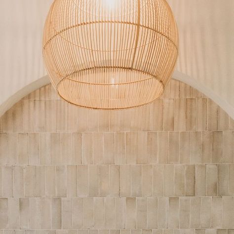 Kristy & Andy on Instagram: "Bathroom Arch 😍 fell in love with those tiles as soon as I saw them. They added the texture & warmth to the space just as I had envisioned 🩷 A few shares as I’ve been bombarded with questions - 
Tiles are the beautiful Rice Natural tile @dilorenzo_tiles @instyleceramics 
Tapware @fienza.au 
Bath - Alpha @tradelinkshowrooms 
Paint @bauwerkcolour limewash Colour - Slow 
Vase @littleleafco 

#myaustralianhome #coastalhome #coastaldesign #modernmedditeranean #whiteandtimber #reno101 #renoinspo #renoschoolstudent #perthrenovations #perthrenos #renovations #foreverhome #rattanpendant #coastalrenovations #aussiereno #australianrenovation  #renovationaustralia
#perthrenovators #bathroomarch #threebirdsrenoschool #renoschoolstudent #bathroomarch" Dune Tiles Bathroom, Natural Tile, Coastal Design, Coastal Homes, I Saw, Arch, Falling In Love, Texture, Instagram