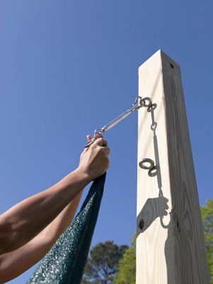 How to Install a Traingle Sun Shade Sail | HGTV Triangle Sun Shades For Patio, Garden Shade Sail Ideas, Sail For Patio Decks, Overlapping Shade Sails, Sun Sail Shade Post Ideas, Backyard Triangle Shade, Sun Shade Backyard, Hanging Sail Shades, Patio Shade Sail Ideas