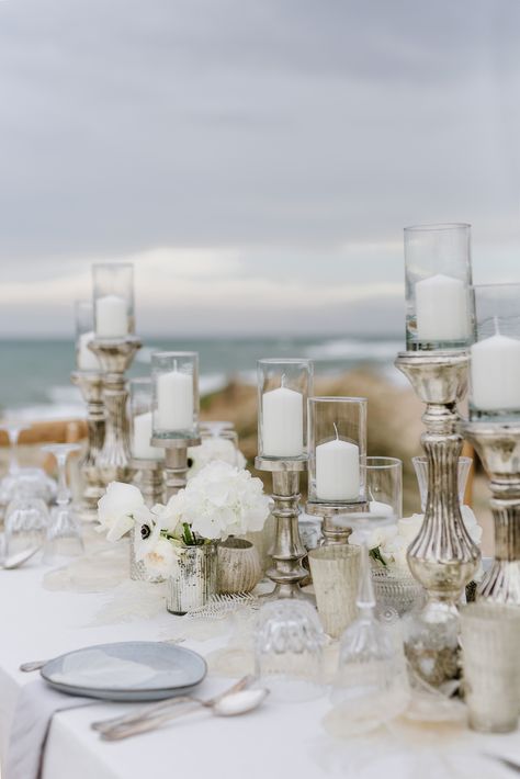 Mother Of Pearl Wedding Decor, Pearl Wedding Decor, Silver Wedding Ideas, Mother Of Pearl Wedding, Blue And Silver Wedding, Wedding On The Beach, Silver Candle Holders, Beach Wedding Centerpieces, Silver Candle