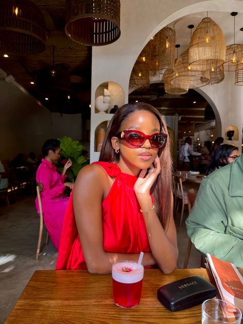 Black woman out for lunch in aesthetic restaurant, wearing versace shades, dressed in a red dress and pink cocktail. Restaurant Dress, Versace Shades, Aesthetic Restaurant, Pink Cocktails, Pink Cocktail, Work From Home Business, In Aesthetic, Instagram Inspo, Picture Perfect