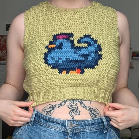 I never posted pics of me as actually wearing my stardew blue chicken top and I got a new phone so my pics are actually half decent now so taking it as an opportunity to repost it hehe #stardewvalley #stardewvalleycrochet #chrochet #stardewvalleyfanart Stardew Crochet Pattern Free, Stardew Valley Crochet Pattern, Crochet Stardew Valley, Stardew Chicken, Stardew Valley Crochet, Crochet Sweater Vest, Blue Chicken, Easy Crochet Projects, Crochet Business