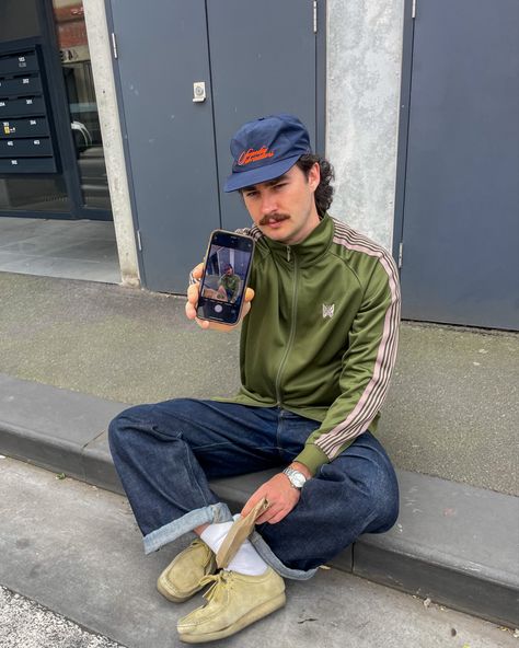 man in japanese fashion outfit sitting on curb asking for his photo to be taken Clarks Wallabees Men Outfit, Wallabees Outfit Men, Track Jacket Outfit, Clarks Outfit, Clarks Wallabees Men, Wallabees Outfit, Track Pants Outfit, Clarks Wallabees, Dapper Style