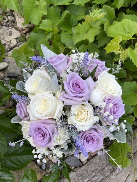 Lavender Roses, Baby Breath, White Roses, Dried lavender makes up this wedding bouquet Bride Bouquets Lilac, Lavender And Roses Bouquet, Light Purple And White Flower Bouquet, White And Purple Bridal Bouquet, White And Purple Flower Bouquet, Lavender White Wedding, Pastel Purple Flowers, Destiny Wedding, Purple Roses Wedding