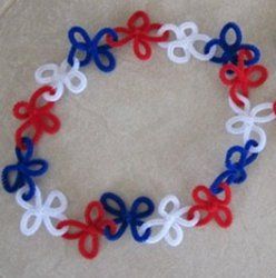 4th of July Pipe Cleaner Leis  http://www.allfreeholidaycrafts.com/Fourth-of-July-Crafts/4th-of-July-Pipe-Cleaner-Leis# Money Leis, Olympics Activities, Olympic Theme, Patriotic Food, Patriotic Jewelry, Stem Crafts, Sensory Tools, Pipe Cleaner Crafts, Luau Theme