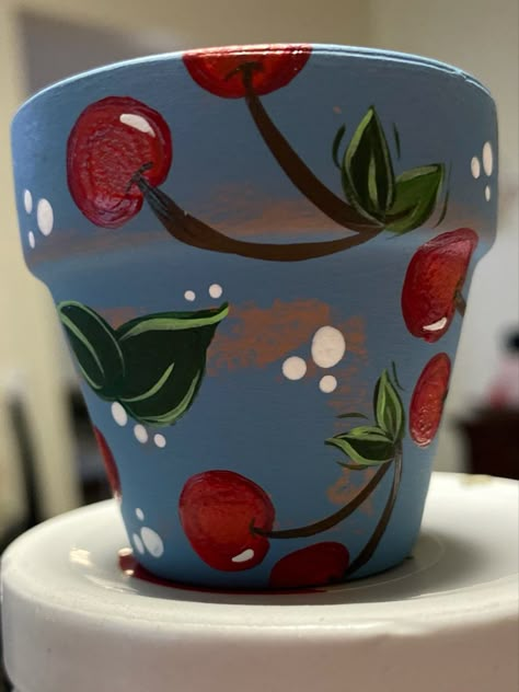 Art by Hervintageroots Fruit Painted Pots, Flower Pots Painting Ideas, Cute Flower Pot Painting Ideas, Hand Painted Pots Diy, Pot Painting Ideas Creative, Flower Pot Painting, Paint Garden Pots, Painting Pots, Terracotta Paint