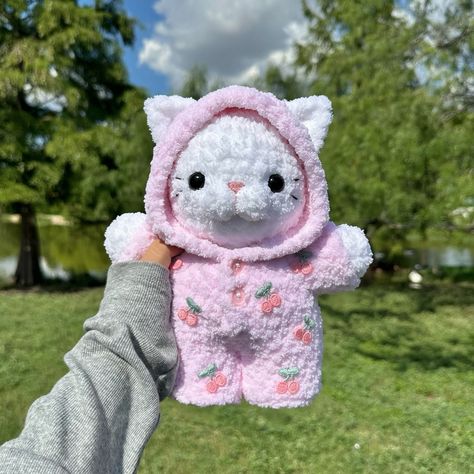 kitty in a pink cherry onesie 🐈🍒 plushie available on my etsy ☁️ pattern by me 🫧 #crochet #amigurumi #crochetkitty #catplush #amigurumicat #crochetcat #crochetplushies Crochet Amigurumi Plushies Free Pattern, Me As A Hobby, Cute Crochet Toys, Crochet Pink Ideas, Pink Crochet Plushies, Pink Crochet Ideas, Knitted Plushies, Pink Amigurumi, Crocheted Stuffed Animals