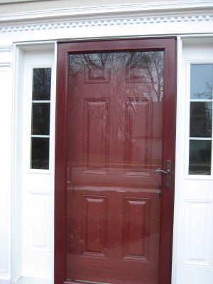 Bright painted door and storm door. Craftsman Front Door With Storm Door, Bronze Storm Door, Paint Storm Door To Match Front Door, Red Front Door With Storm Door, White Storm Door, Full Lite Storm Door, Hoa Ideas, Porch Projects, Front Door With Screen