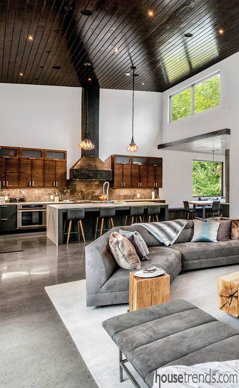 Concrete House Flooring, Concrete Floor Home Interior Design, Black Concrete Floors Living Room, Barndo Concrete Floors, Homes With Concrete Floors, Modern Rustic Concrete Floors, Modern Farmhouse Concrete Floors, Barndominium Kitchen With Concrete Floors, Farmhouse With Concrete Floors