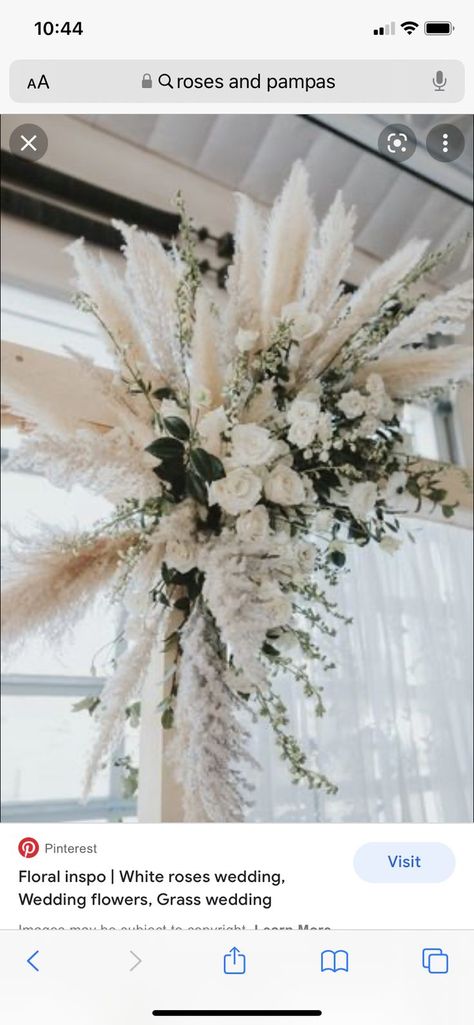 Pampas Mixed With Greenery, Dried Floral Arrangements Wedding Arch, White Flowers With Pampas, Pampas Grass White Roses Centerpiece, Boho Arbor Flowers, Dried Flower Arch Wedding, Pampas And Greenery Wedding, White Pampas Grass Wedding, Arbor Floral Arrangement