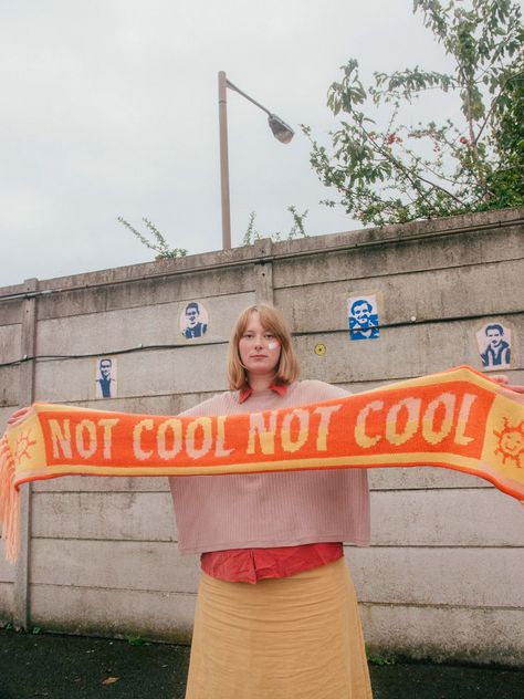 Adapt launches Protest Gear, a football scarf-inspired collection emblazoned with activist slogans Protest Clothing, Graphic Scarf, Calls To Action, Football Scarf, Clothing Labels Design, Human Canvas, The Duo, Scarf Outfit, Fashion Graphic Design