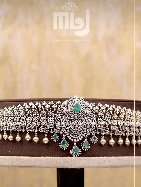 Modern yet sophisticated wedding jewellery! Finely crafted diamond vaddanam with emerald is designed for your unique occasions #mbajranglalsonsjewellers #vaddanam #diamond #jewellery #bridesofinstagram #designerjewelry #finejewelry #gold #diamondjewelry #jewelleryaddict #luxurywedding #bridesessentials #bridaljewellery #designerjewelry #hydjewellery #bride #instagood #hyderabad #necklace #instajewellery #jewelleryreels # Vaddanam Diamond, Diamond Vaddanam Design, Diamond Vaddanam, Simple Gold Bangle, Vaddanam Designs, Indian Diamond Jewellery, Waist Jewelry, Diamond Bracelet Design, Diamond Necklace Designs