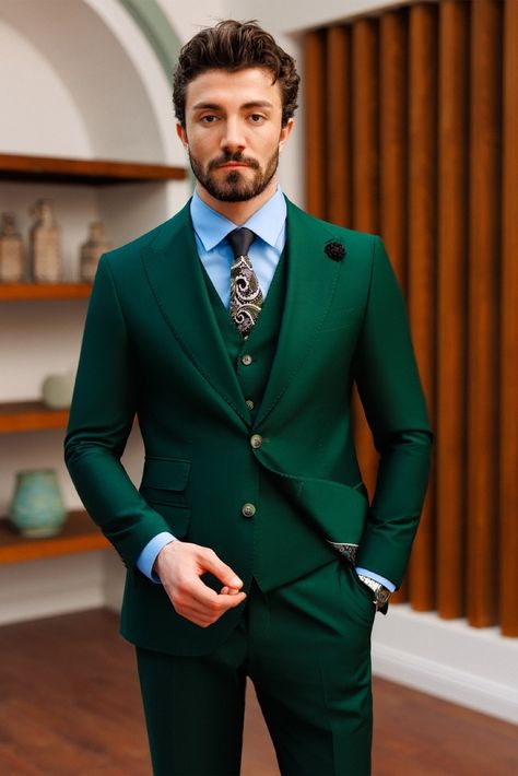 Make a striking impression with our green slim-fit suit 3-piece, a testament to impeccable style and sophistication. Its distinguished peak lapels and carefully tailored, fully lined interior create a look that exudes confidence and captivates the room with its magnetic charm. #greensuit #suit #suits #suitup #formalattire #menstyle #menfashion #gentleman #dapperlook #formalwear #fashioninspo Groom Suit Trends, Blazer Waistcoat, Suit Styles, Suit Stores, Slim Fit Suit Men, Suits Men, Designer Suits For Men, Mens Casual Dress Outfits, Suit Men