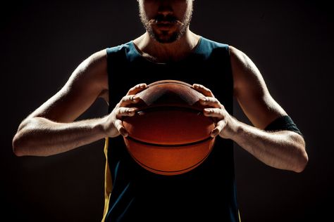 Free Photo | Free photo silhouette view of a basketball player holding basket ball on black space White Studio Background, Power Rankings, Nba Mvp, Rookie Of The Year, Basketball Tournament, Nba Championships, Basketball Leagues, Boys Basketball, Red Team