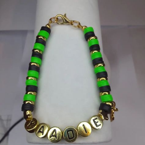 Feel the Rhythm of Jamaica on Your Wrist with Our New 'YAADIE' Bracelet that Celebrates Island Vibes and Vibrant Style.✨🇯🇲 • Green Clay beads • Black Clay beads • Star beads • Letter beads • Gold hoops • Leaf Charm • Bead sizes: 8mm • Size: 16cm (adjustable) • Price= $645 #GotBeaded #gotbeadedbracelets #beadedbracelets #bracelets #jewellery #accessories #jamaica #yaadie #explore Feel The Rhythm, Star Beads, Bead Sizes, Vibrant Style, Green Clay, Black Clay, Island Vibes, Jewellery Accessories, Letter Beads