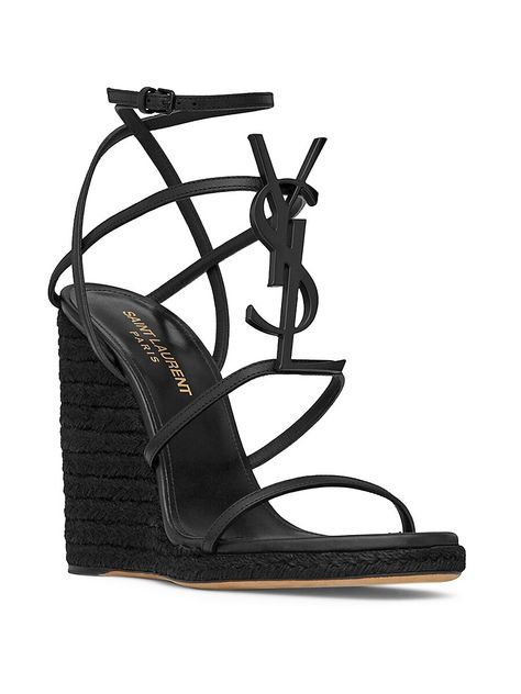 Find SAINT LAURENT Cassandra Wedge Espadrilles In Leather With Black Monogram on Editorialist. Espadrilles made with metal free tanned leather with jute wedge heel, featuring straps decorated with metal YSL initials and an adjustable buckle. Total Heel Height: 11.5 cm/ 4.5 Inches Arch Height: 10.5 cm/ 4.1 Inches Platform Height: 1 cm/ 0.3 Inches Leather Sole Black Metal Hardware. Saint Laurent. Color: Nero. Size: 6. Ysl Cassandra, Brown Wedge Sandals, Yves Saint Laurent Shoes, Black Leather Wedges, Wedge Espadrilles, Ankle Strap Wedges, Black Espadrilles, Leather Espadrilles, Black Wedge Sandals