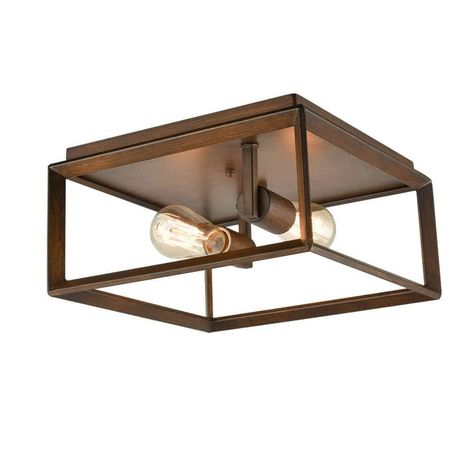 Flaunting a wood grain finish, the flush mount ceiling light lends a hint of industrial charisma to your home decor. Its iron cage shade offers a warm and diffused light and adds a farmhouse charm to your living space. Its rectangular shade introduces bold geometric accent to your aesthetic. Crafted of solid iron, it is durable and rustproof. Its UL listed ceramic lamp-holders are high temperature resistant. Its open design enables you to replace the bulb easily. It is a awesome addition to your Kitchen Shades, Lights Ideas, Metal Ceiling Lighting, Light Fixtures Flush Mount, Farmhouse Charm, Light Bulb Types, Ceramic Lamp, Open Design, Rustic Industrial