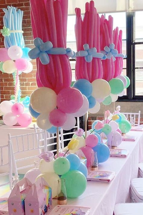 Don't miss this colorful Trolls themed birthday party! The balloon centrepieces are wonderful! See more party ideas and share yours at Catchmyparty.com #catchmyparty #partyideas #trolls #trollsparty #girlbirthdayparty Girls Trolls Birthday Party, Trolls Birthday Party Outfit, Trolls First Birthday Party Ideas, Trolls 2 Birthday Party Ideas, Trolls Poppy Birthday Party Ideas, Trolls Candy Table Ideas, Trolls Birthday Party Ideas Decorations Centerpieces, Trolls Theme Party, Trolls Birthday Centerpieces