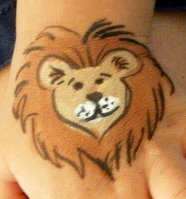 3-min Lion, cheek design Lion Face Paint, Easy Face Painting Designs, Animal Face Paintings, Face Painting For Boys, Cheek Art, Arm Painting, Arm Art, Face Painting Easy, Kids Face Paint