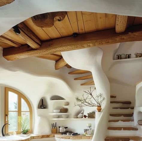 Cob House Fireplace, Straw Clay House, House With Tree Inside, Cob House Design, Modern Cob House, Clay House Ideas, Cob House Interior, Rustic Beams, Sand House