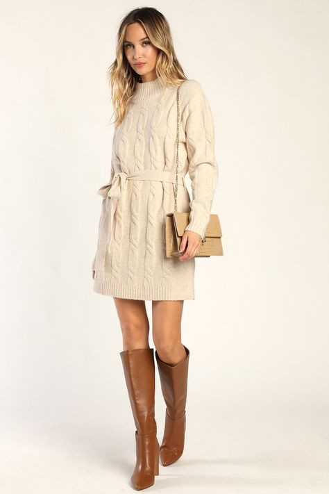 Bundling up for the season has never looked so fabulous thanks to the Lulus Warmed Up To You Cream Cable Knit Mock Neck Sweater Dress! Thick, cozy wool-blend cable knit shapes a mock neckline, long sleeves, and a relaxed bodice. The shift silhouette falls to a cute mini hem and features a tying belt that allows you to cinch the waist. Contrasting ribbed knit accents the neckline, cuffs, and hem. Fit: This garment fits true to size. Length: Mid-thigh. Size medium measures 32.5" from shoulder to h Neutral Sweater Dress, Fall Cream Dress, White Sweater Dress With Tights, Winter Church Dresses, Winter Proposal Outfit, Sweater Dress And Boots Outfit, Winter Dresses Outfit, Cream Sweater Dress Outfit, Fall Dress Outfit With Boots