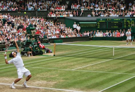 Roger Federer serves to Andy Roddick during the 2005 Wimbledon final. Wimbledon Final, Andy Roddick, Roger Federer, Wimbledon