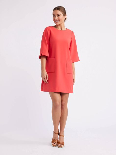 RE24DR135 in Sunrise. Length: 90.5cm. Introducing the Kelsey Shift Dress in a vibrant red shade. Its sleek design includes a flattering crew neckline, elbow-length sleeves, and chic front pocket detailing. Crafted from luxurious crepe fabric, this above-knee dress features an off-body fit for ultimate comfort. Complete with a stylish loop and button closure at the back, it's the perfect choice for any occasion. - Shift silhouette - Pull on style. Shift Dress Styles, Denim Short Jumpsuit, Review Australia, Shift Dresses, Lace Evening Dresses, Review Dresses, Knee Dress, Cardigan Top, Knitwear Cardigan