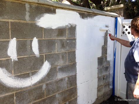 Painting a Cinder block fence @Remodelaholic (10 of 23) Cinder Block Fence, Cinder Block Paint, Concrete Block Retaining Wall, Easy Fence, Concrete Block Walls, Cinder Block Walls, Concrete Retaining Walls, Small Fence, Concrete Fence