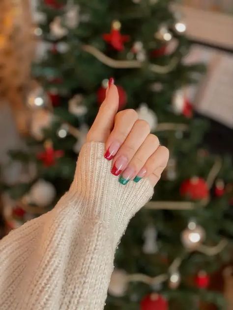 40+ Trendy Christmas Nails To Try This Holiday Season (2023) Xmas Nails Simple Sparkle, Easy Christmas French Tip Nails, Red And Green Tips Nails, Red White And Green French Tip Nails, Christmas Nails Red And Green French Tip, Red And Green Tip Nails, Cute Christmas Nails Simple French Tips, Green French Tip Nails Christmas, Red And Green French Nails