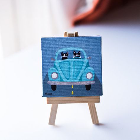 Teal Mini VW -Painted with Golden acrylics. -3 x 3 Mini Wrapped canvas -Topped with two coats of gloss varnish. -Signed, titled, and dated on the back by me! A fun little tael Volkswagen bug painting, with cats of course! Comes with its own little wooden easel. -------------------------------------------------------- The sides of the painting are painted black. -------------------------------------------------------- I ship via USPS First Class Mail. Please contact me ... Vw Painting Canvas, Volkswagen Painting Canvas, Mini Square Canvas Art, Mini Paintings Simple, 4x4 Painting, Bug Painting, Painting Date, Mini Easel, Volkswagen Bug