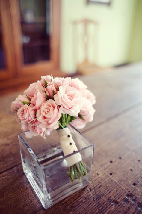 The bridesmaids and junior bridesmaid will carry small bouquets of pale pink spray roses wrapped in ivory linen with the stems showing. Rose Bridesmaid Bouquet, Pink Spray Roses, Class Wedding, Prom Bouquet, Simple Wedding Bouquets, Bridal Bouquet Pink, Prom Flowers, Wedding Flower Inspiration, Blush Rose