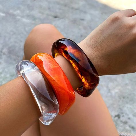 Step into summer with our Statement Vintage Chunky Bangles! Crafted from colourful irregular acrylic resin, each bangle is a unique geometric masterpiece, reminiscent of retro charm. The tortoiseshell design adds a touch of timeless elegance, perfect for those sunny summer days. Whether you're lounging by the pool or strolling along the beach, these bracelets are the ultimate accessory for adding a pop of colour to any outfit. Embrace your individuality and elevate your style with our vibrant an Chunky Bangles, Acrylic Bracelet, Geometric Bracelet, Resin Bangles, Bangles For Women, The Bangles, Stainless Steel Bangles, Chunky Bracelets, Couple Jewelry