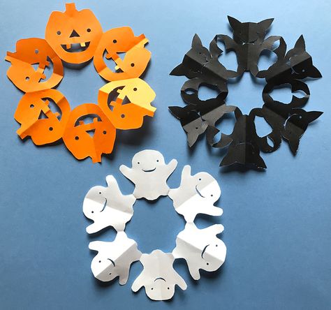 Step-by-step tutorial with photos showing how to fold & cut out Halloween paper snowflakes - Ghost, Bat, and Pumpkin designs! Made with origami paper and cut out using scissors and a hole punch.   #halloween #halloweencraft #halloweendecorations #halloweendecor #ghost #bat #pumpkin #papersnowflake #snowflake #artproject Halloween Pumpkin Paper Crafts, Origami Ghost Step By Step, Halloween Paper Snowflakes, Paper Halloween Decorations Diy, Halloween Paper Pumpkin, Diy Halloween Paper Decorations, Halloween Origami Step By Step, Paper Craft Halloween, Diy Halloween Paper Crafts