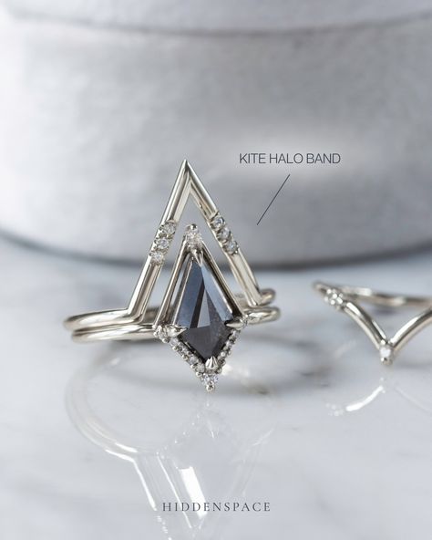 Stacked for a statement with kites all the way! Many of our wedding bands feature an architectural chevron design, perfectly crafted to complement and seamlessly stack with our unique kite-shaped engagement rings. #hiddenspace #finejewelry #kiteshapedring #saltandpepperdiamondring #artdeco #architecturaldesign #modernvintage #whitegoldring #platinumring #diamondalternative #handmadejewelry #stackingrings #weddingringset Kite Shaped Diamond Ring, Triangle Engagement Ring, Shaped Wedding Band, Kite Ring, Gothic Wedding Rings, Temptation Island, Kite Diamond, Diamond Stacks, Engagement Ring Shapes