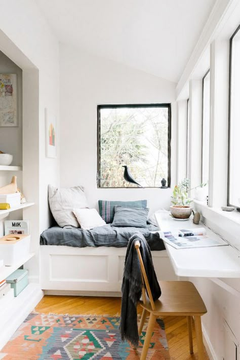 Double Duty - The 19 Most Incredible Small Spaces on Pinterest - Southernliving. In small spaces, some rooms simply have to work overtime. Here, a cozy nook just begs to be curled up in with a good book, while a narrow tabletop provides an extra work surface.   See Pin Murphy Bed Ikea, Tiny Office, Narrow Rooms, San Francisco Houses, Space Apartments, Small Home Office, Spare Room, Murphy Bed, Window Seat