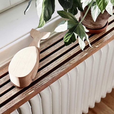 Hide Ugly Radiators with These 12 Clever Cover Ideas | Family Handyman Diy Radiator Cover, Radiator Shelf, Hiding Ugly, Minimalist Shelves, Fireplace Cover, Forced Air Heating, Classic Furniture Design, Interior Wood Doors, Create Decor